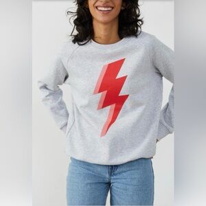 Gray Sweatshirt with Red Lightning Bolt Graphic